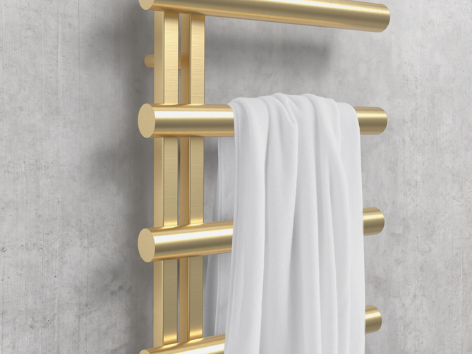 Zehnder_RAD_StudioCollection_Chime-HY_BrushedBrass_concretebackground_Closeup Chime, Studio Collection, new finishes, N209, straight PVD, brushed brass, concrete wall, Closeup, bathroom